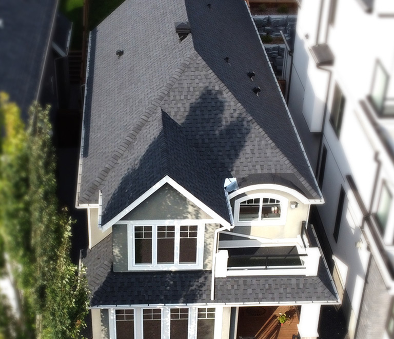 Aerial view of home with new shingles