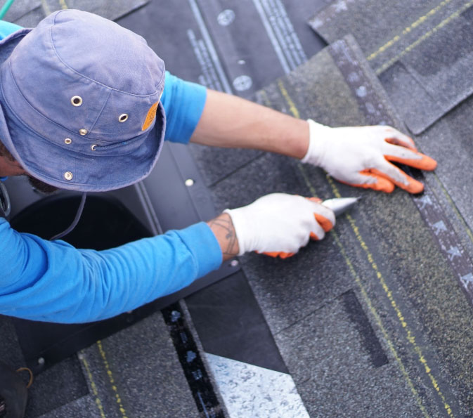 Man working for Residential Roof Repair