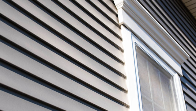 Faded Colour Siding Service in Calgary